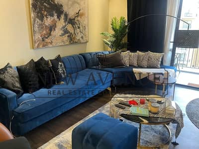 For sale fully furnished apartment ready to move with open greenery view prime location in sodic Eastown new Cairo