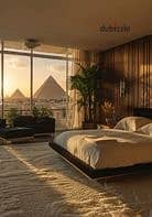 21m² hotel room for sale with direct Pyramids views—fully finished furnished and air-conditioned A prime USD investment opportunity with installments