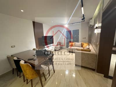 شقة مفروشة فندقي للإيجار في مدينتي B12 | 78م | أمام East Hub مباشرة