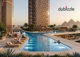 42m² hotel room for sale with direct Pyramids views—fully finished furnished and air-conditioned A prime USD investment opportunity with installments