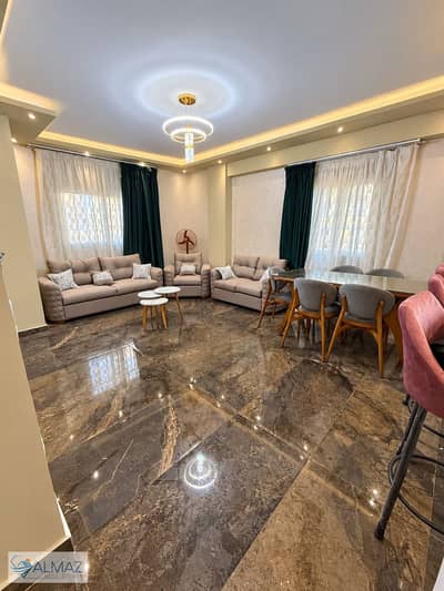 Furnished apartment with hotel-standard finishing and furnishings for rent in Gardenia Heights 3, Fifth Settlement; located directly on Mohamed Naguib