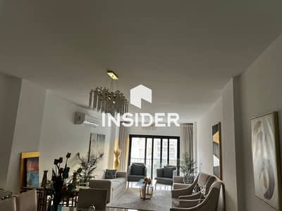 A premium Apartment For Rent InFifth Square El  Marasem, New Cairo, Offering A Spacious 233sqm With Roof 124 with a practical design kitchen, and ACs.