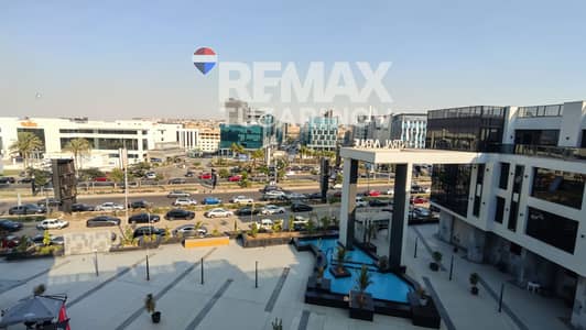 مكتب راقي للإيجار في قلب الشيخ زايد متشطب بالكامل بمساحة 86 متر + تراس 16 متر . بإطلالة مفتوحة أمام كابيتال بيزنس بارك و مول سنترال افينو