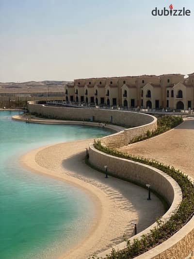 Luxury 5Bedroom Corner Townhouse with a stunning lake view 50% discount or flexible installments on Suez Road near Rehab The Spine Mountain View