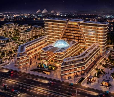 For sale 56m with a distinctive facade and double view in Giza Crown Tower mall overlooking the Pyramids in the heart of October Gardens, the Italian neighborhood, less down payment and the longest repayment period