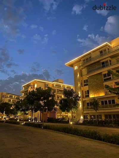 apartment ground with garden prime location ready to move 157M view garden and club in mountain view icity new cairo
