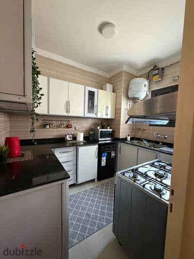 Furnished apartment for rent in Madinaty B8 - hotel finishing - repetitive fifth floor - garden view - area 155 meters - next to phase services and the central city services area - air-conditioned