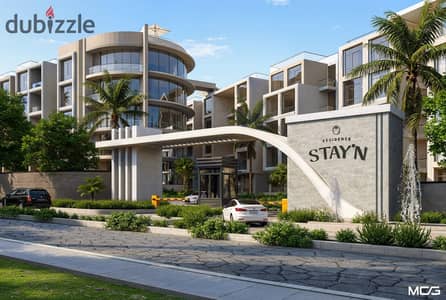 73m finished hotel-style apartment at Stay Inn Al-Wahat Road near MSA with hotel services 10% down payment and installments up to 9 years