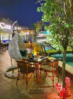 For rent, a very special opportunity at a commercial price, a shop with an internal area of 125 meters + an external area of 200 meters at | Dahshour Link, Water Park Walk - Sheikh Zayed