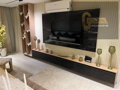 Furnished hotel apartment for rent in Al Rehab, fully furnished next to the Eastern Market and the bank complex prime location with a wide garden view