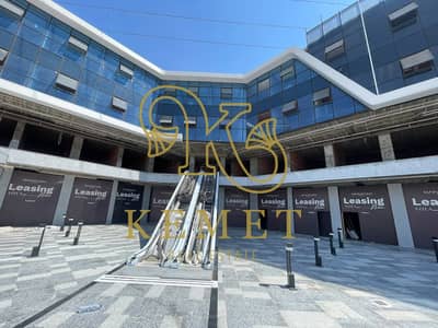 48.5 sqm ground-floor shop at Artia Mall by Mainlands, facing Gamal Abdel Nasser Axis. EGP 5.5M instead of 7.5M, balance over 3 years.
