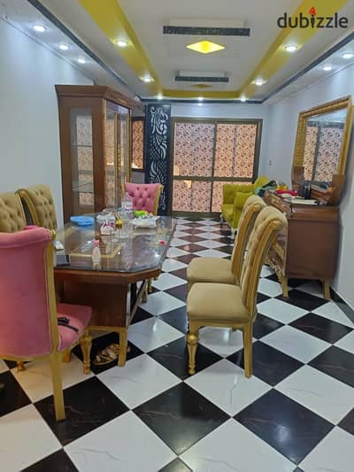 Luxurious furnished apartment for annual or winter rent, high-end finishing, with all amenities: water, electricity, Wi-Fi, and elevator. 3 bedrooms, reception in two parts, kitchen, bathroom, second floor in Alexandria, Al Agami, kilo 21 at Al Nakheel beach in a very distinctive location.
