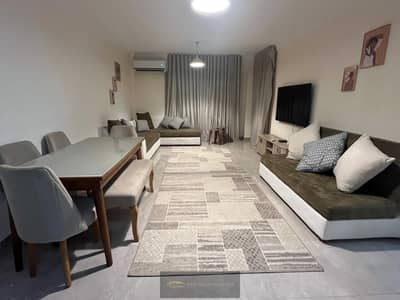 Furnished apartment for rent in Jannah Zayed 2 Compound - Sheikh Zayed, 130 square meters, in a lively location with complete furnishings and ready for immediate housing, fully furnished and air-conditioned