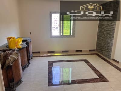 Office for rent in Sheraton Airport Residence, Minister's Square, next to Abu Bakr Al-Siddiq Mosque and Saint Michael Church, 110 meters, fourth floor, staircase, two bedrooms, and a two-piece reception