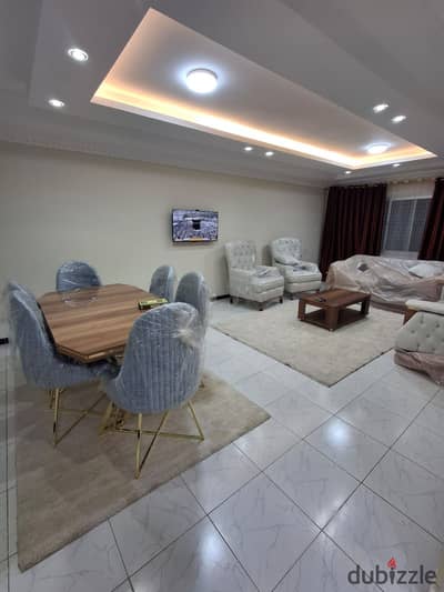 Furnished apartment for daily rent in Sheraton Airport Residences, Khaled Bin Al-Waleed Street, in front of Abu Bakr Al-Siddiq Mosque, 120m, first floor, two bedrooms and a two-piece reception, fully air-conditioned.