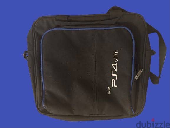 PS4 slim 1TB + 2 controllers + ps4 slim bag 4