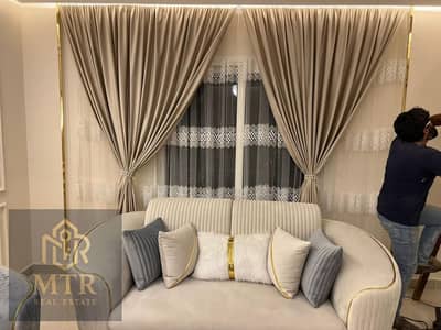 Furnished apartment available for rent, first occupancy, featuring special finishes and located close to East Market and the newest phases of Al Rehab