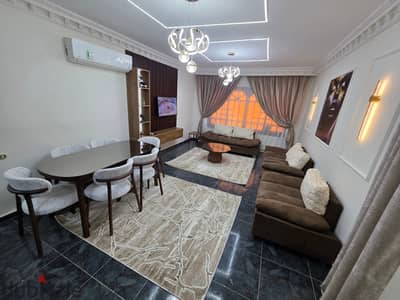 Furnished, air-conditioned hotel-style apartment next to City Stars, available for daily and monthly rent for families. Excellent location in Nasr Cit