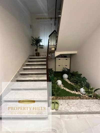Cheapest 3-level corner townhouse in New Cairo, prime landscape view, on Gamal Abdel Nasser Axis, minutes from AUC.