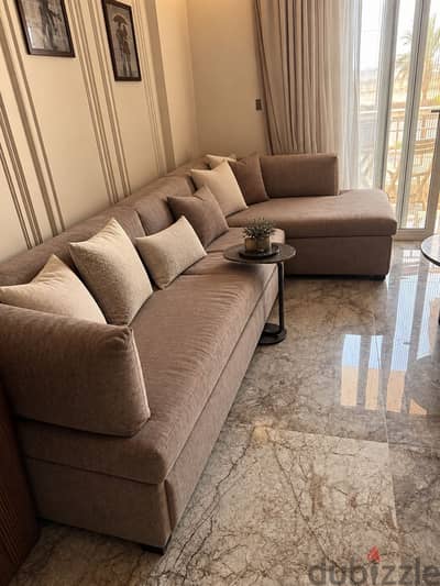 L shaped good used sofa