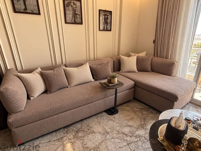 L shaped good used sofa 1