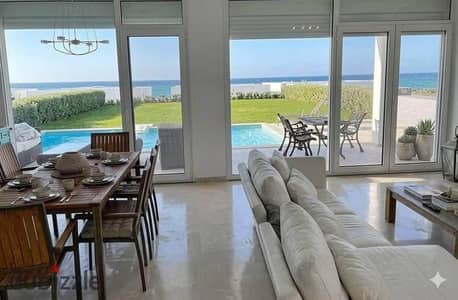 A premium chalet for sale in Direction White – Ras El Hekma, North Coast, featuring an open direct view of the pool, fully finished and ready to move. A premium chalet for sale in Direction White – Ras El Hekma, North Coast, featuring an open direct view of the pool, fully finished and ready to move.