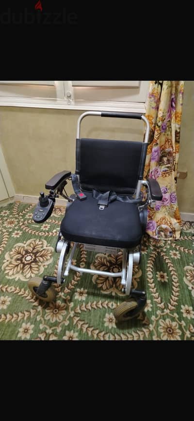 Freedom Chair كرسي كهربائي قابل للطي بعصا تحكم
