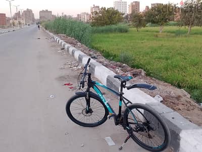 عجله اتوم استورم مقاس ٢٦  حالة الزيرو استخدام ٤ شهور فقط