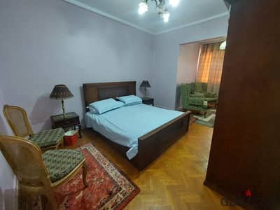 Furnished apartment for rent, two bedrooms, reception, 2 bathrooms, kitchen, balcony, annual rent - in downtown