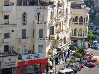 For sale, Al-Korbah, rare opportunity, corner property, 2040m, 80m frontage, main street, comprising 13 shops and 16 apartments, income of 360,000 monthly.