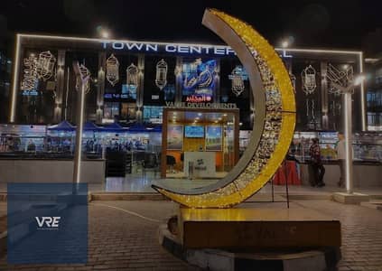 own your shop and receive your rent in town center 1