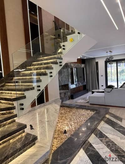 Three story villa at first launch prices prime location with open landscape view for sale in Fifth Settlement near AUC Mountain View and Madinaty