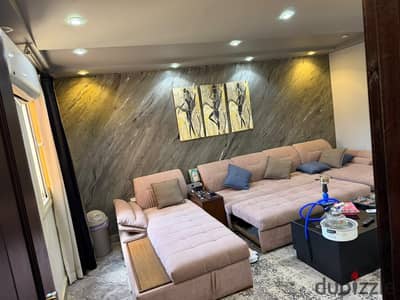 Available furnished apartment with new furniture on Makram Ebeid Main
