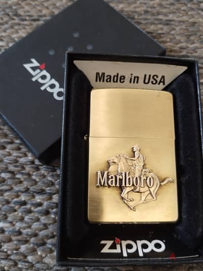 ولاعه zippo بنزين مارلبورو نووووووادر ال zippo  اورجينال اصليه