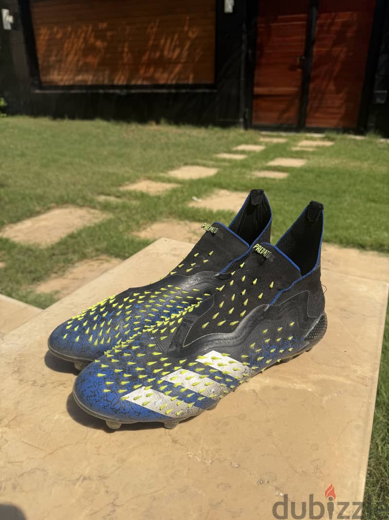 predator firm ground boots 4
