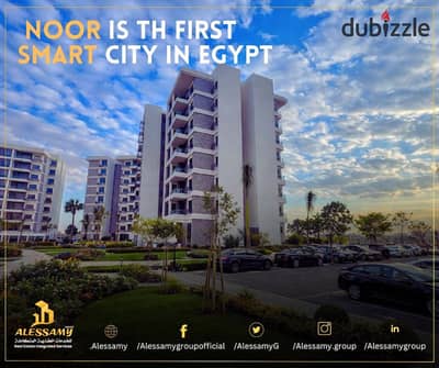 Apartment for sale with installments over 12 years in Al Noour City, 98 meters in B2, lowest down payment, view of a wide garden facing the north.
