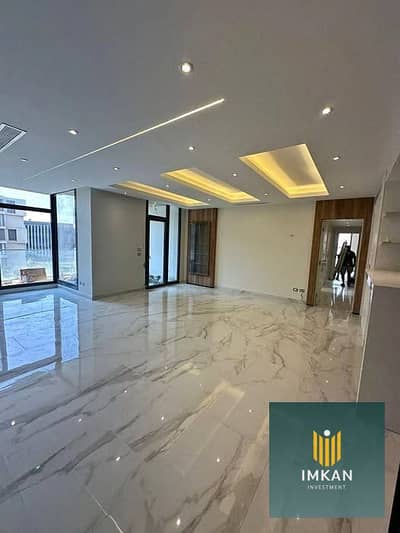 Apartment for sale in the SODIC East compound (El Shorouk/New Heliopolis, near Madinaty) with a 700,000 EGP down payment and the balance payable over