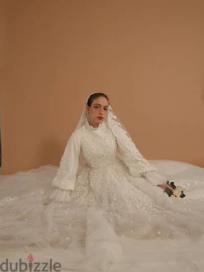 a hand made wedding dress used only