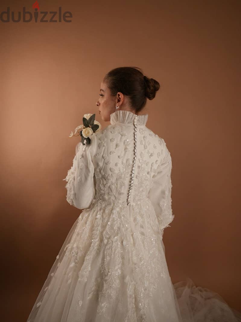 a hand made wedding dress used only 2