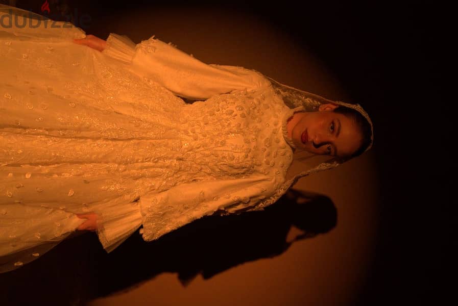 a hand made wedding dress used only 3