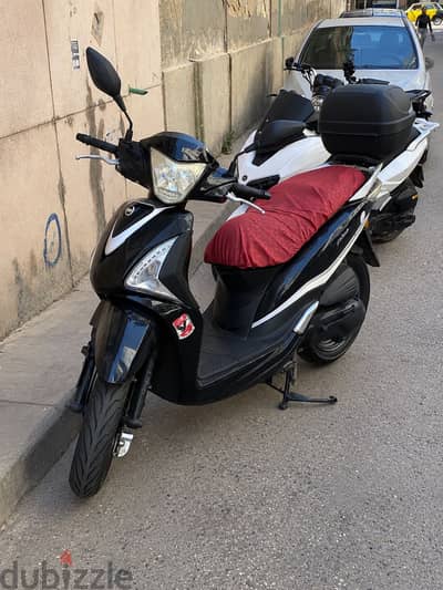 سكوتر sym st