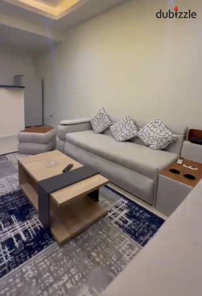 Furnished ground floor apartment with garden for rent in Sheikh Zayed district 12, Mostaqbal buildings
