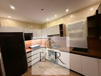 For rent, an apartment in Al-Rehab 2, furnished, super lux, first occupancy, ground floor with garden