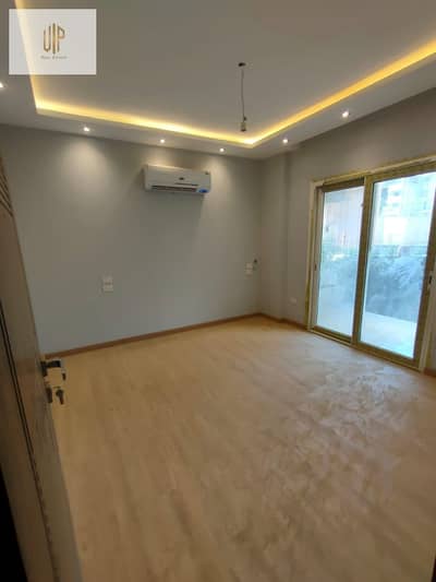 Ground floor apartment with a garden for sale in Mountain View iCity New Cairo with super-luxe finishing and air conditioning