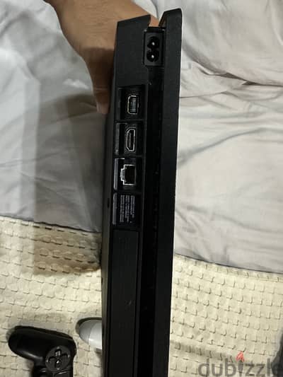 PS4 Slim 500GB + 2 Original Controllers – Good Condition