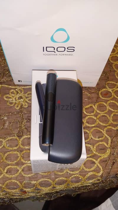 iqos iluma جديده لم تستخدم الا تلت ايام فقط جديده معاها ضمان سنه