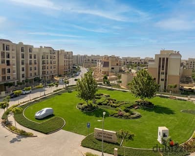 A distinguished apartment with a lake view is for sale with a 12-year installment plan. It's located next to The Spine and Open Air Mall, opposite Al