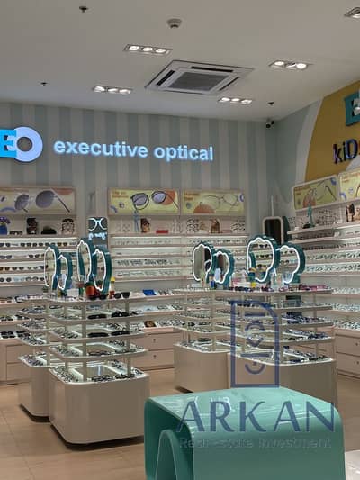Commercial shop for sale, 37 sqm – First floor, facing the main street in October Gardens (Italian District Road), next to the Mobil gas station and A