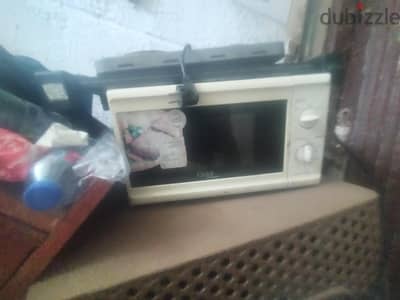 ميكروويف ممن الخاررخ مستعمل ويعممل بكفاءة قوي جدا 01006865868