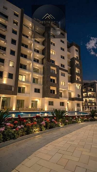 Immediate delivery apartment in the Administrative Capital CBD, directly on the Southern Bin Zayed Axis, overlooking the Green River